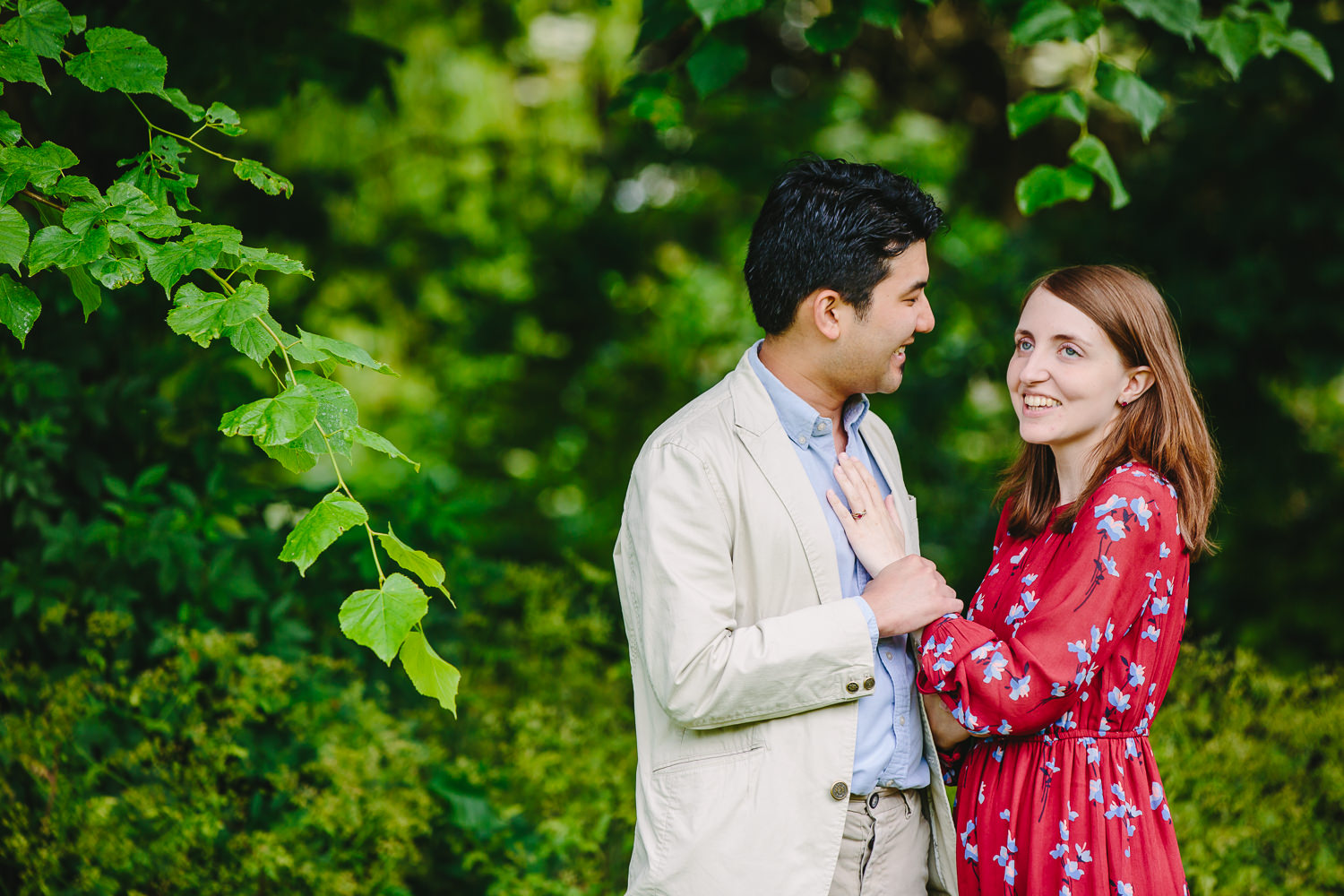 Engaged couple in Ely, photographed by Ely Photographer. Trees and greenery.
