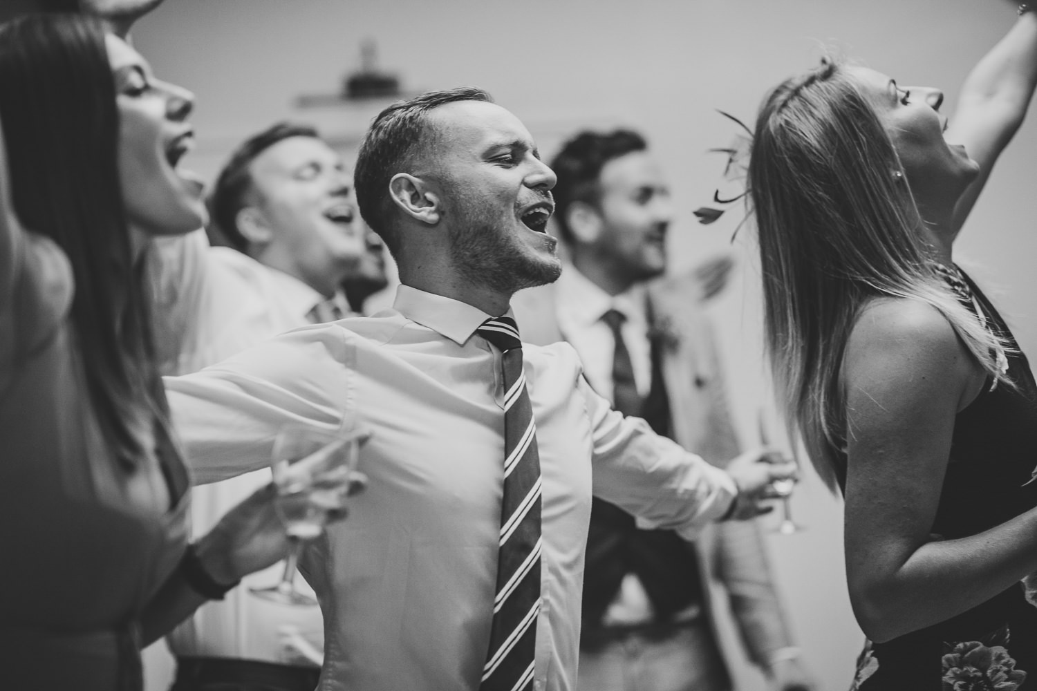 Wedding guests dancing