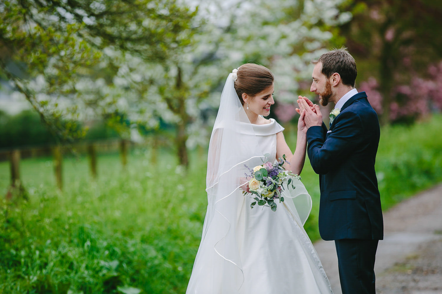 Bride and groom in meadow. Portrait