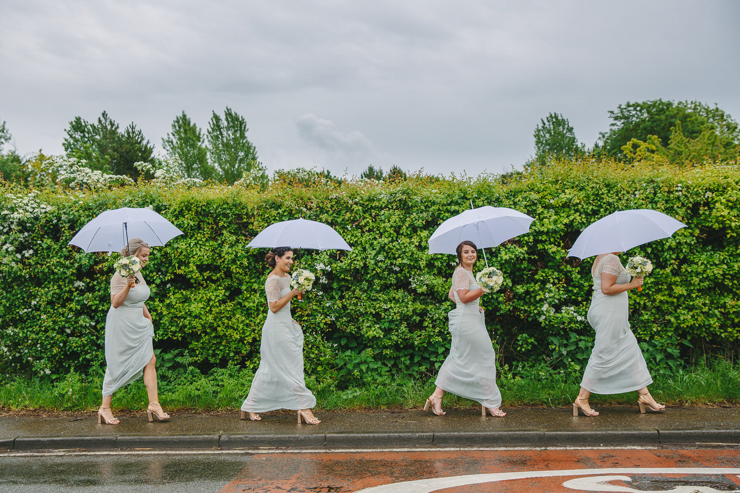 Four brides maids, green dresses, walking