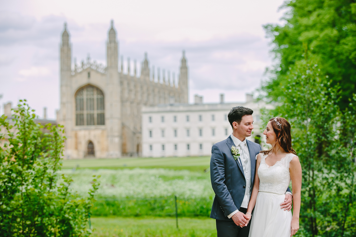 Bride and groom in ront of Kings College Cambridge