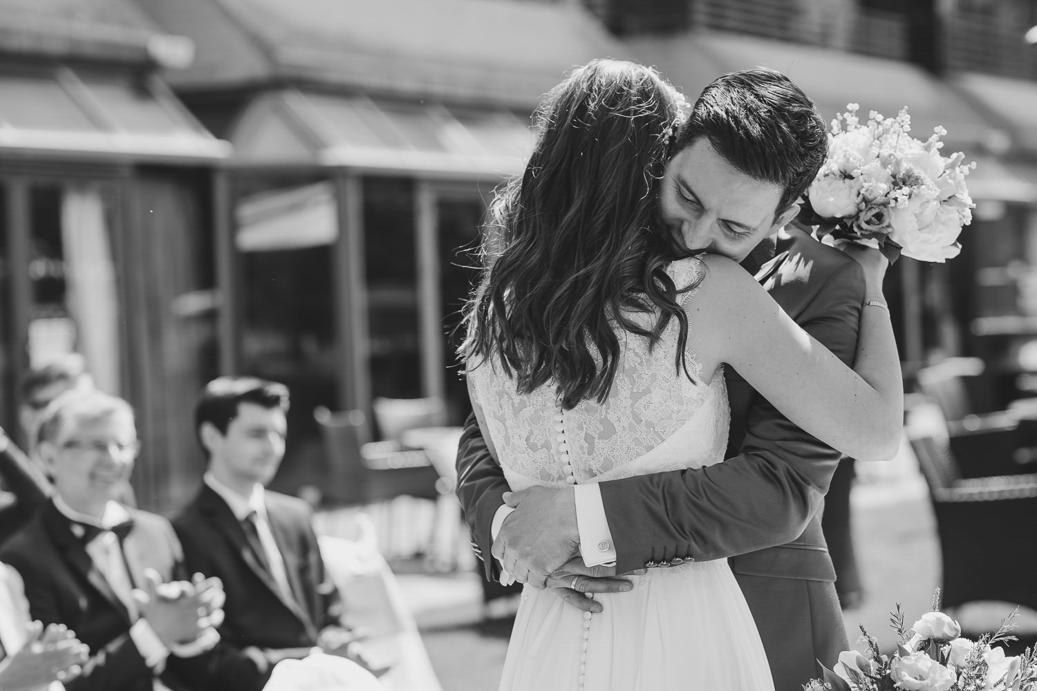 Bride and groom hugging