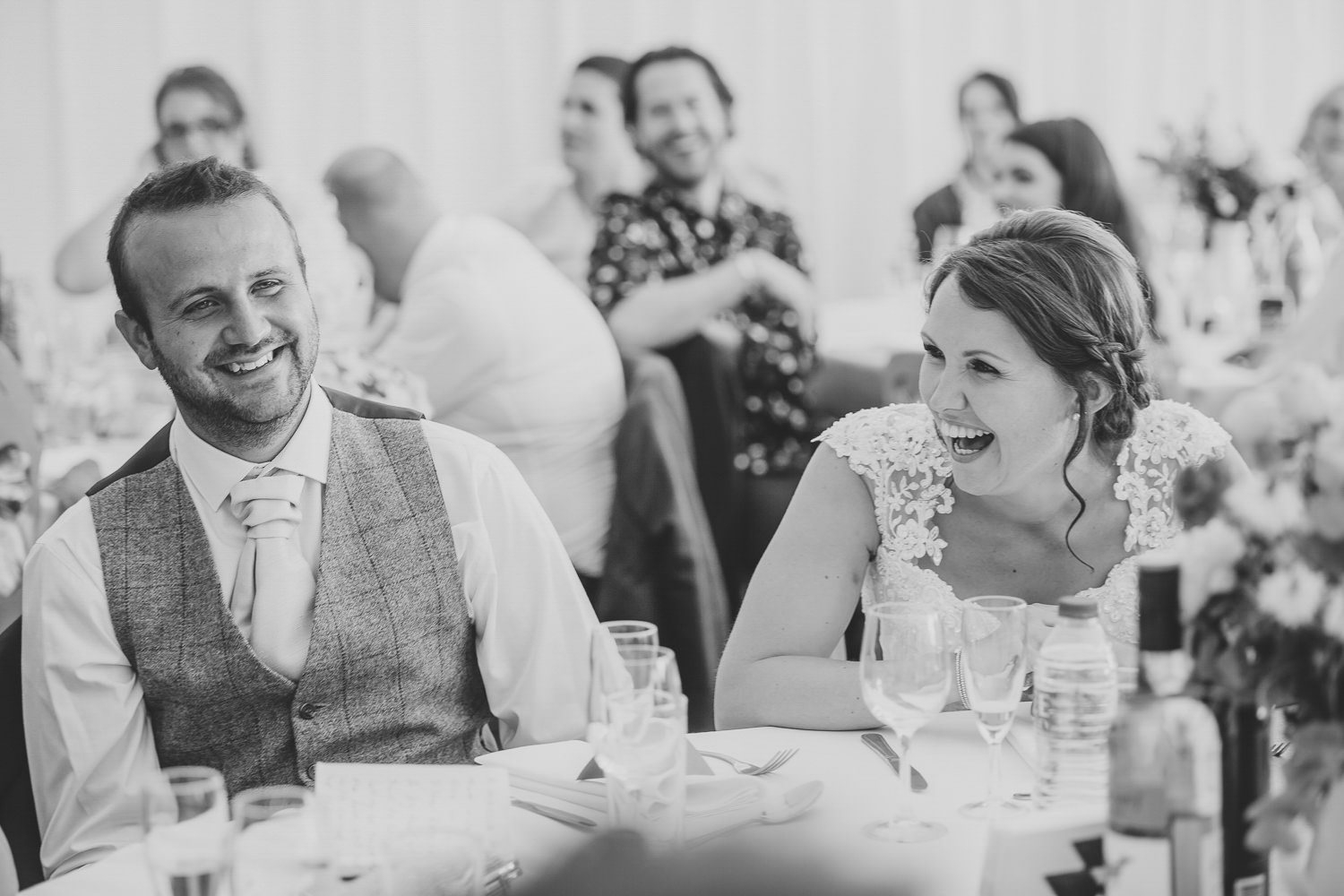 Bride and groom laughing