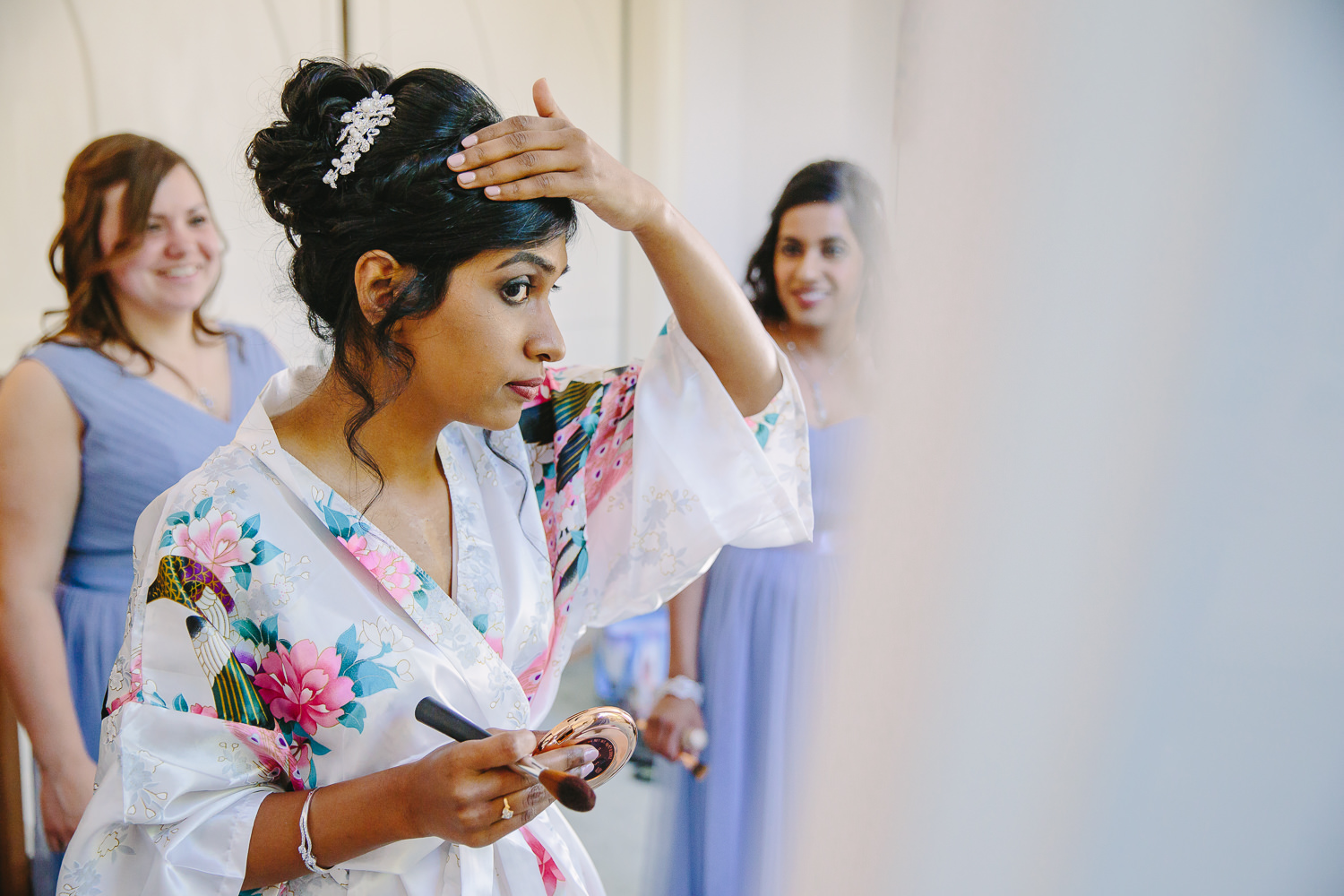 Bride looking in a mirror