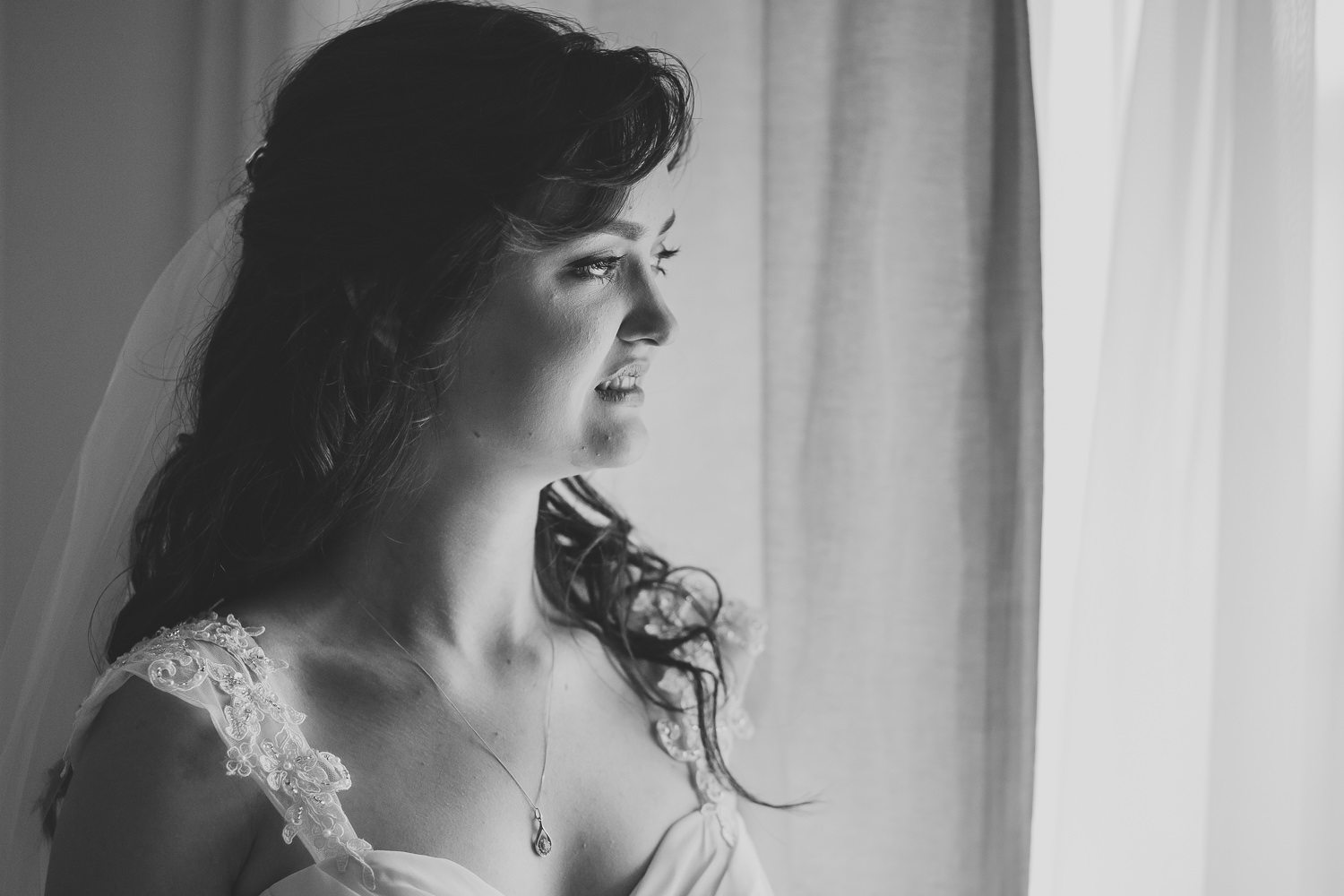 Black and white portrait photo of a bride