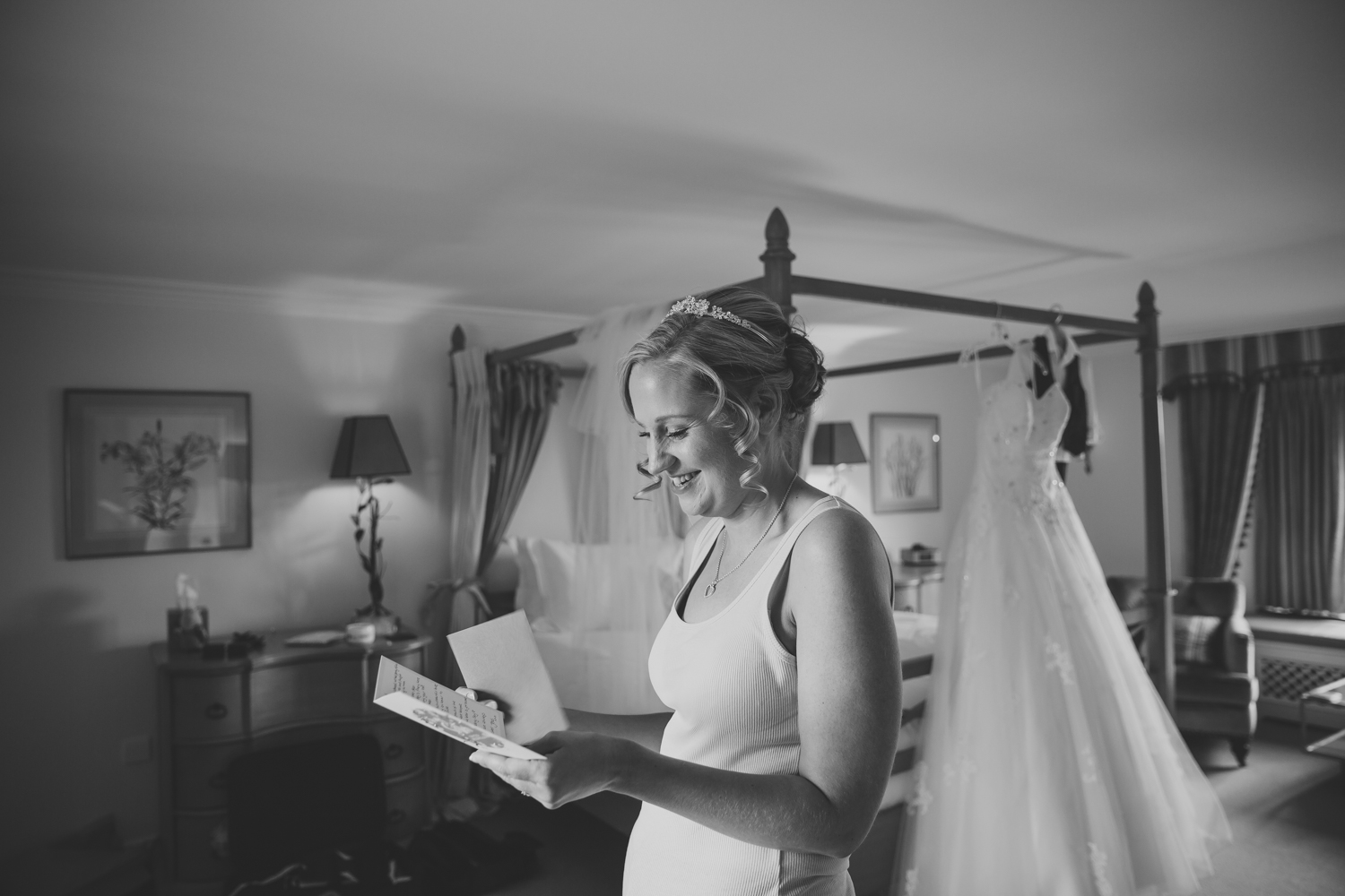 Ely wedding photographer photo of bride reading a letter
