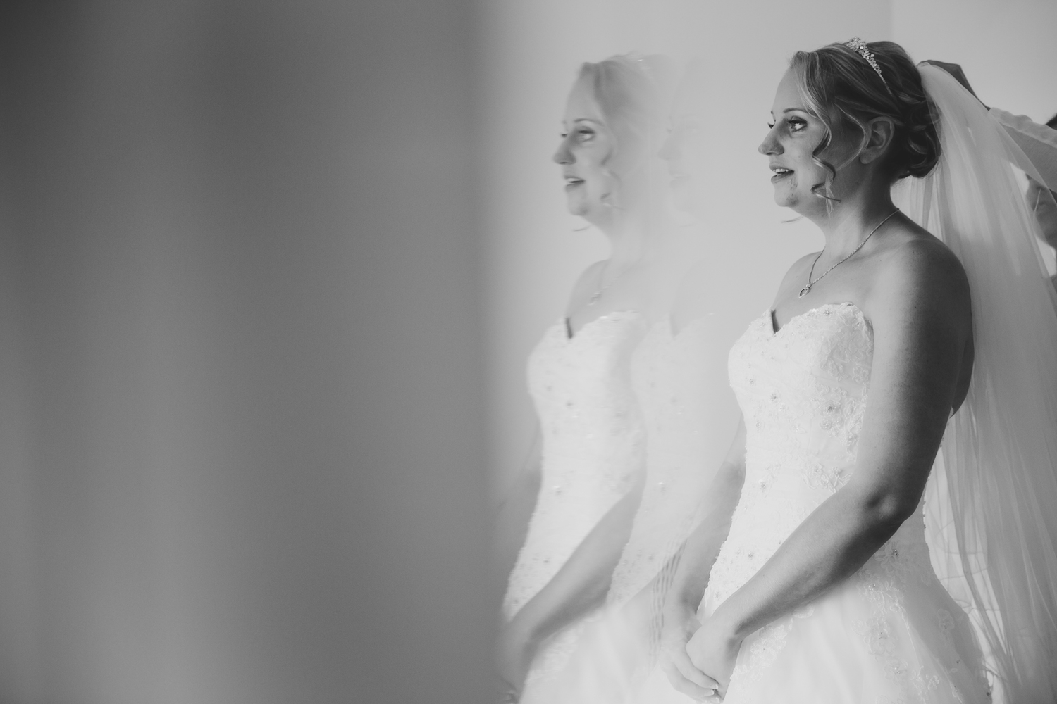 Ely wedding photographer photo of bride's reflection at The Old Hall Ely