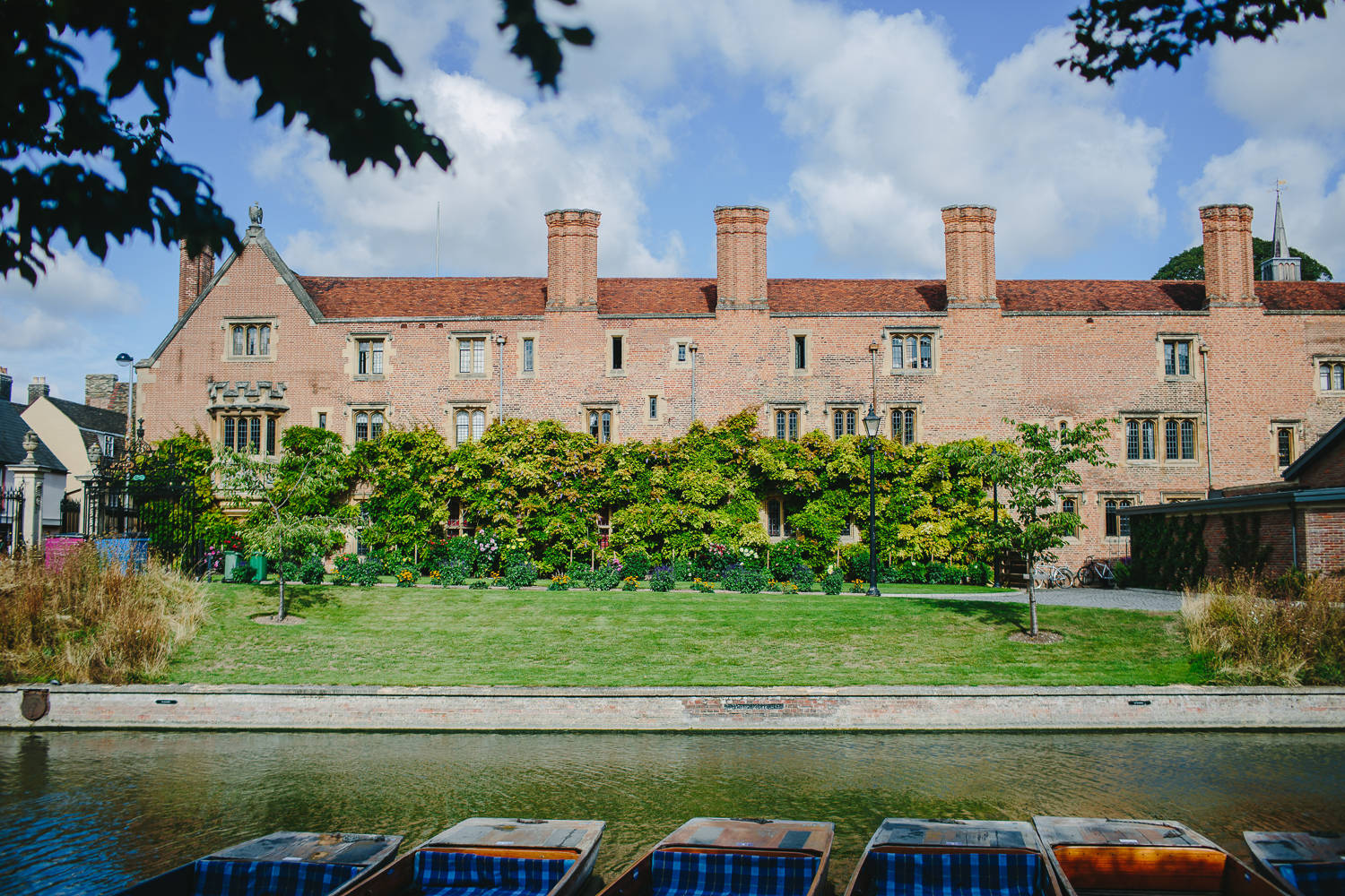 Scenic view of Magdalene college cambridge University, from across the river. Capture by Cambridge University Wedding Photographer