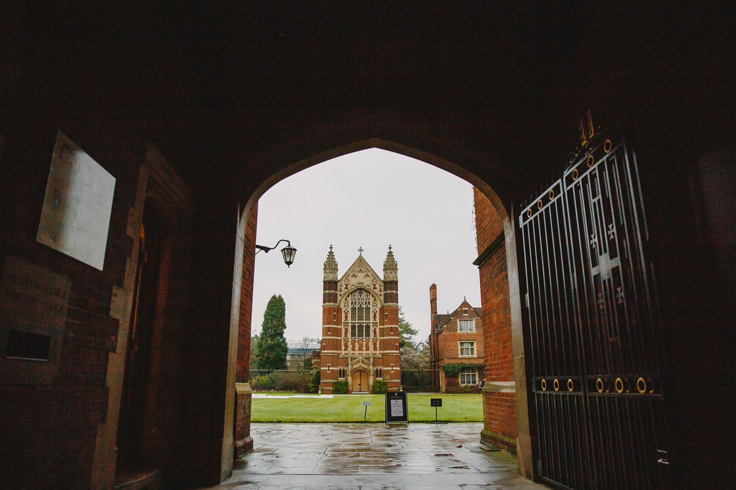 Selwyn Cambridge University College chapel framed by an archway